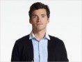 Ian Harding plays Ezra Fitz